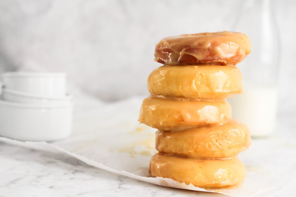 Carmilk donuts with milk bottle in the background