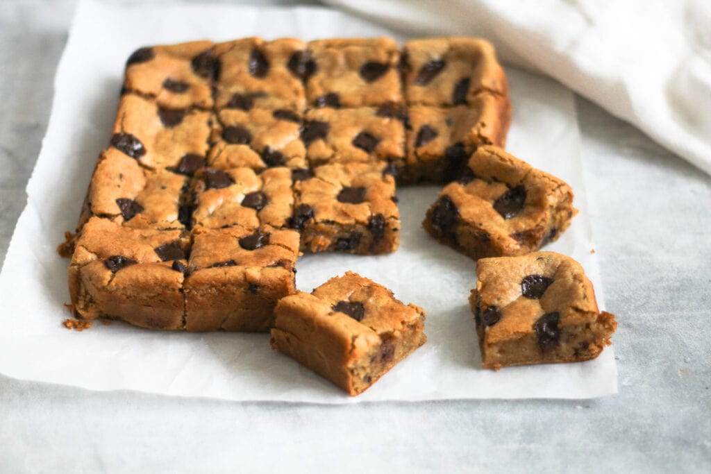 Peanut butter chocolate chip chickpea blondies cut into squares