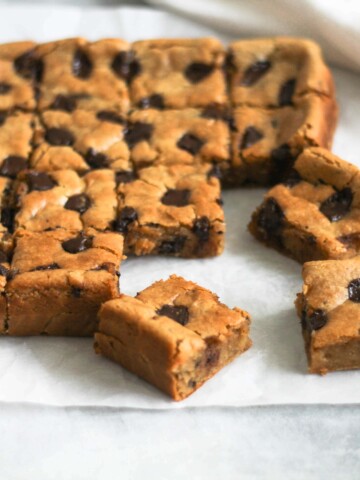 Peanut butter chocolate chip chickpea blondies cut into squares