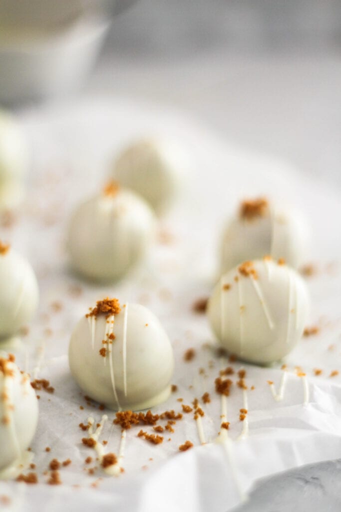 White chocolate truffle balls on parchment paper