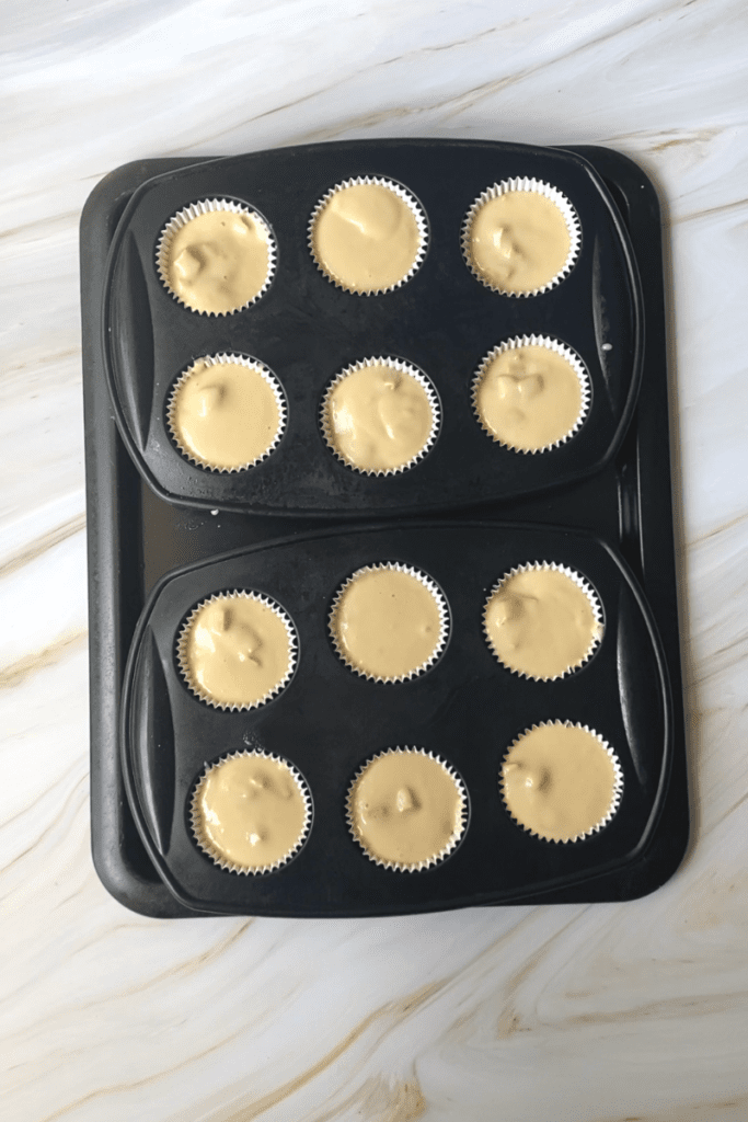 Muffins filled into pans