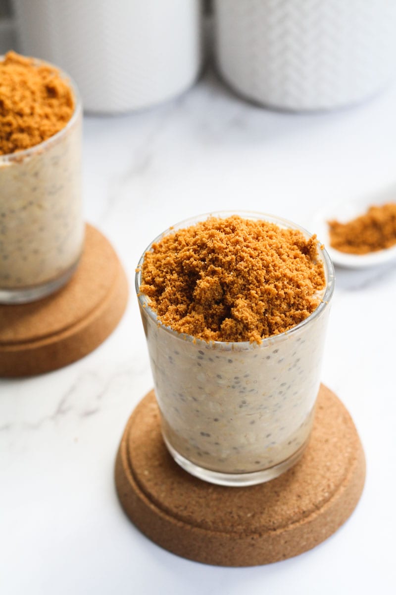 overnight oats topped with biscoff crushed cookies view angled from above