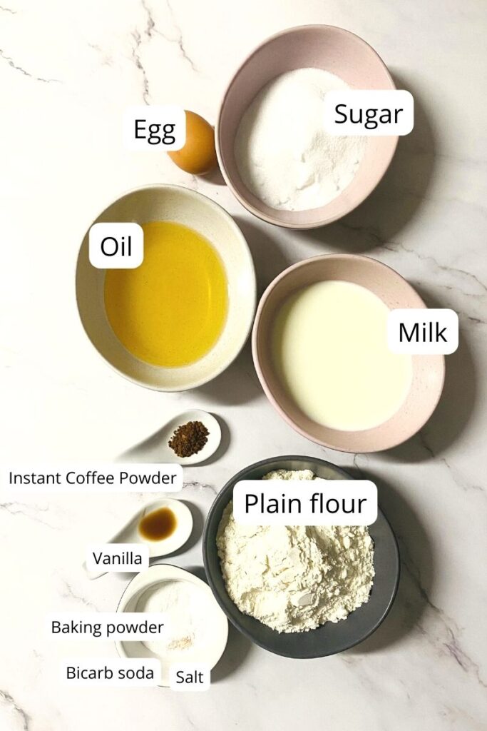 Ingredients for coffee flavoured donuts laid out in bowls