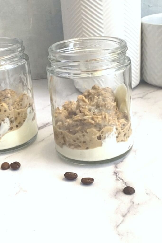 Yogurt and tiramisu oats in jar.