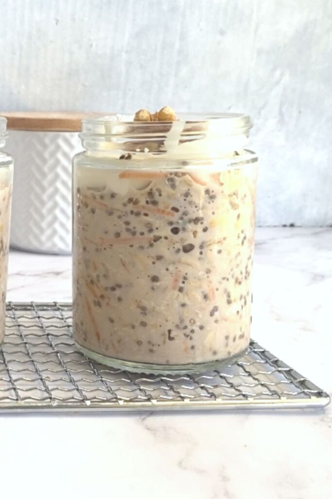 Carrot cake overnight oats topped with yogurt and walnuts.