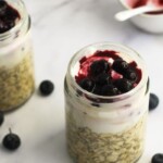 Blueberry cheesecake overnight oats in jars.