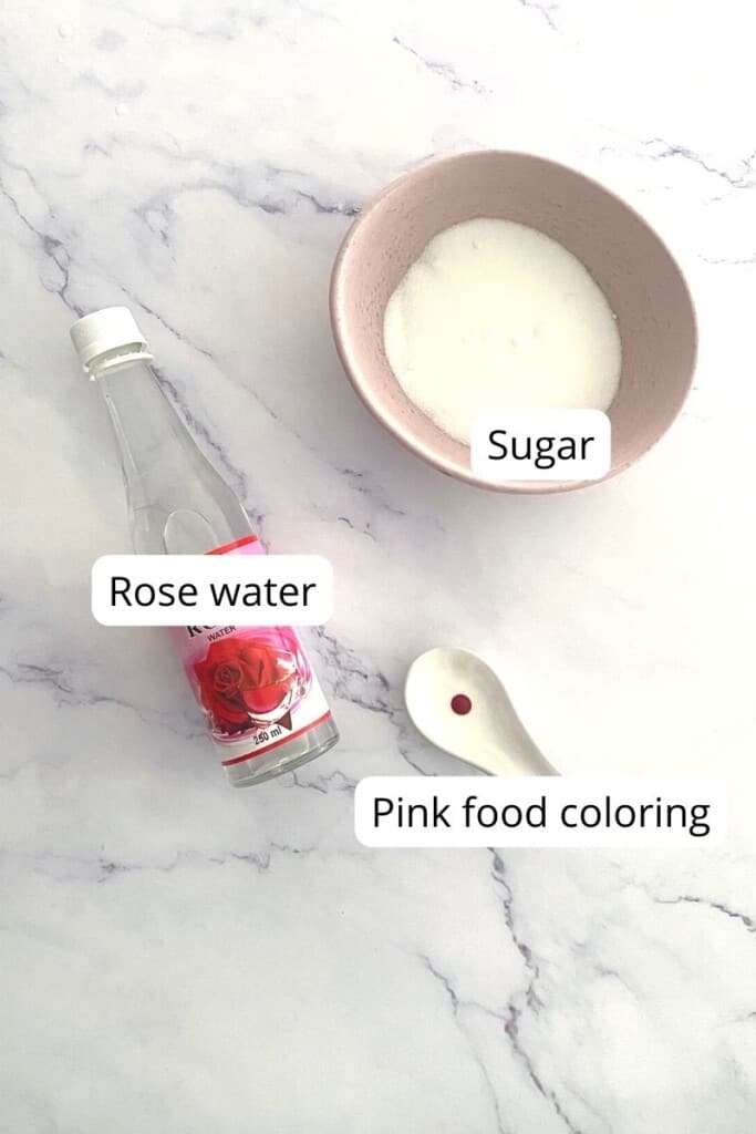 Ingredients needed to make rose syrup.