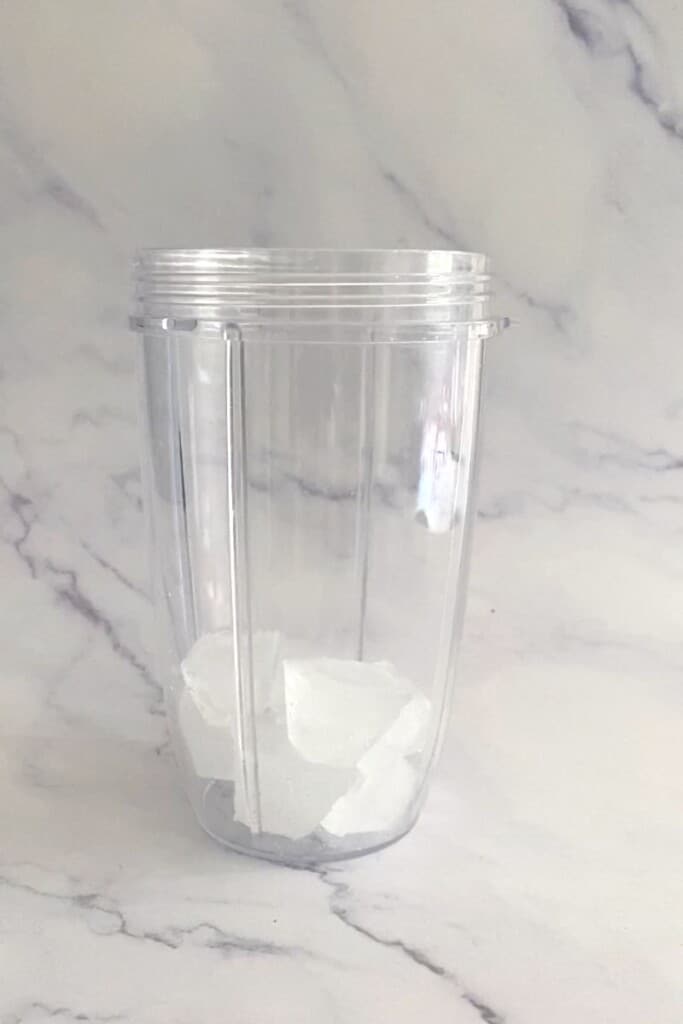 Ice in a blender for oreo milkshake.