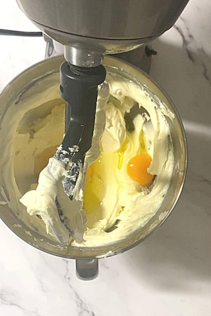 Eggs added into cream cheese mixture.